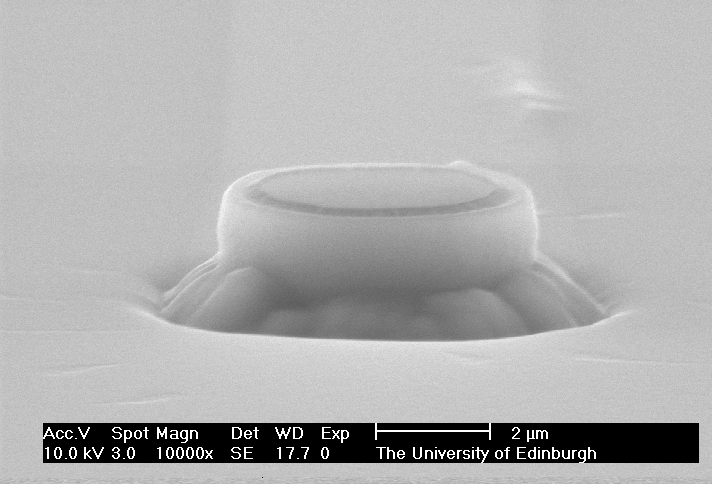 The nozzle of a planar patch clamp fabricated in a silicon wafer, viewed through an electron microscope